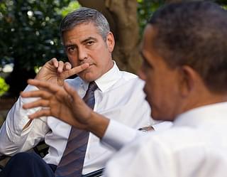 Clooney may be sitting with Obama here but Amal Alamuddin is as ‘eligible’ as Clooney is.