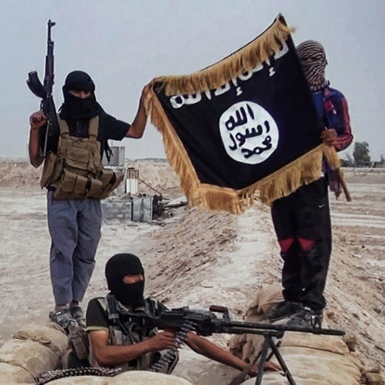ISIS terrorists waving their flag.