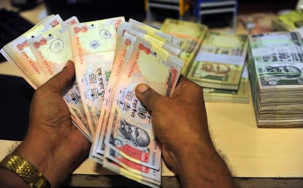 Old high-denomination currency notes. (GettyImages)
