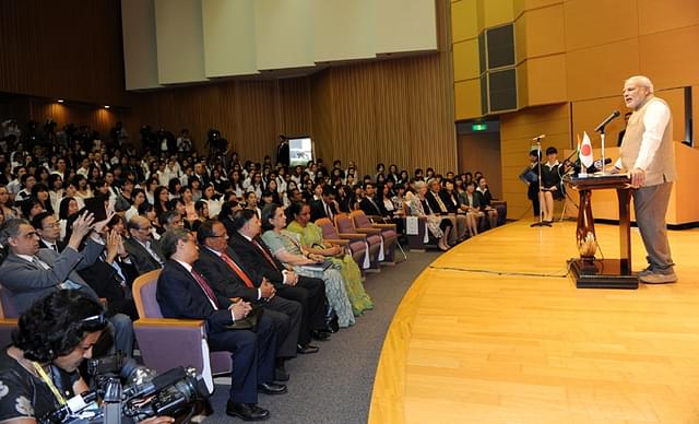 Modi addressing a meeting at the University of Sacred Heart, Tokyo