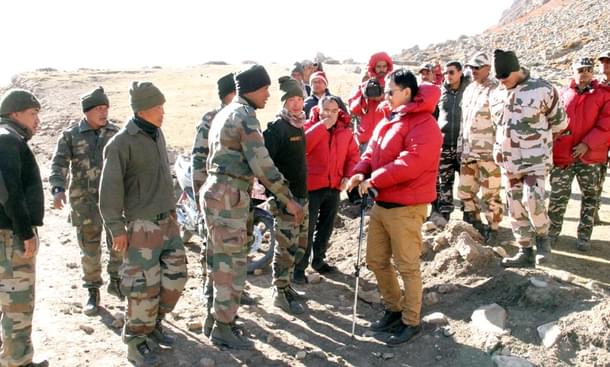 The MoS for Home Affairs, Kiren Rijiju being briefed by the SSB officers.