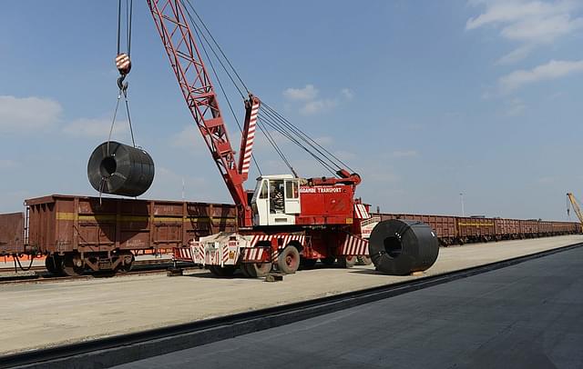 Freight unloading at a terminal near Ahmedabad (SAM PANTHAKY/AFP/Getty Images)