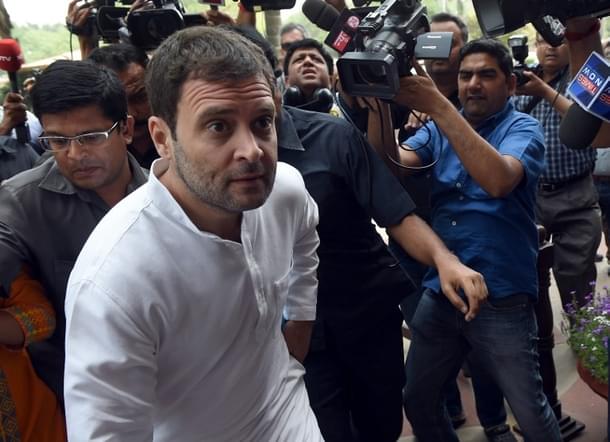 Rahul Gandhi arrives in Parliament on April 20. (Credits: AFP PHOTO / PRAKASH SINGH)