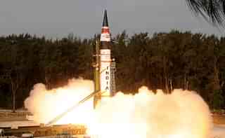 Agni missile test-fired from a movable platform. (DRDO)
