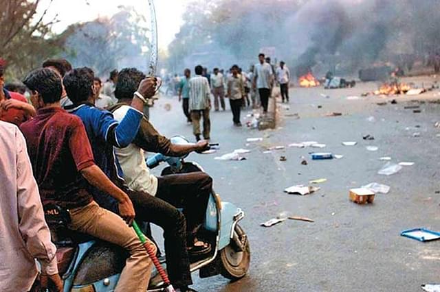 Gujarat Riots, Photo Credit: <a href="http://indiaplex.com/gujarat-riots-18-get-life-imprisonment-in-the-ode-village-mass-murder/24/" shape="rect">IndiaPlex</a>