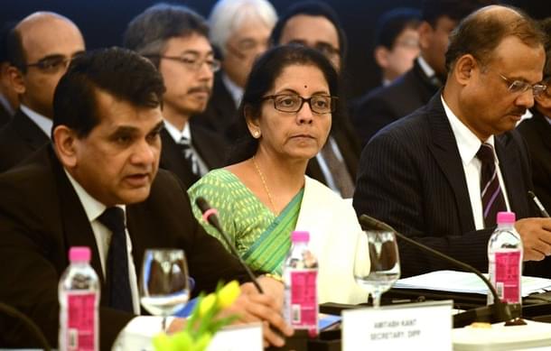 Commerce Minister Nirmala Sitharaman (centre) (Credits: AFP PHOTO/Money Sharma)
