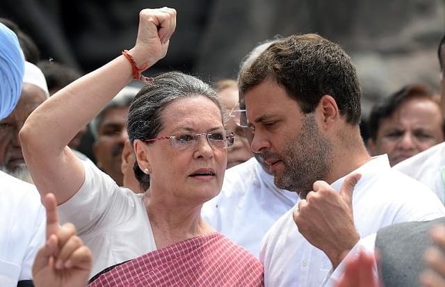 Sonia and Rahul Gandhi protesting against the suspension of Congress MPs. (Credits: AFP PHOTO/PRAKASH SINGH)