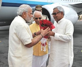 Nitish Kumar as CM welcomes Modi at Patna Airport, on July 25, 2015.