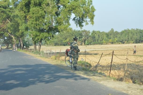 A BSF trooper keeps watch on Madhya Mashaldanga.
