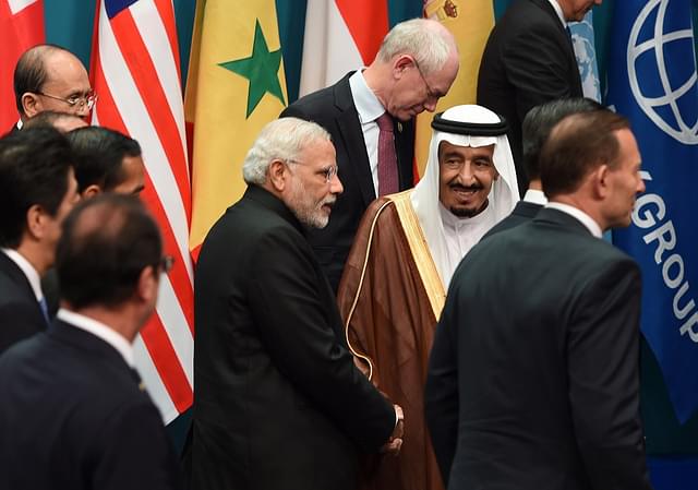 

Saudi Arabia’s Crown Prince Salman bin Abdulaziz (2nd R) shakes hands with India’s Prime Minister Narendra Modi (C) after they joined heads of states and international organizations for a ‘family photo’ during the G20 Summit in Brisbane on November 15, 2014. Australia is hosting the leaders of the world’s 20 biggest economies for the G20 summit in Brisbane on November 15 and 16. AFP PHOTO / Saeed KHAN (Photo credit: SAEED KHAN/AFP/Getty Images)
