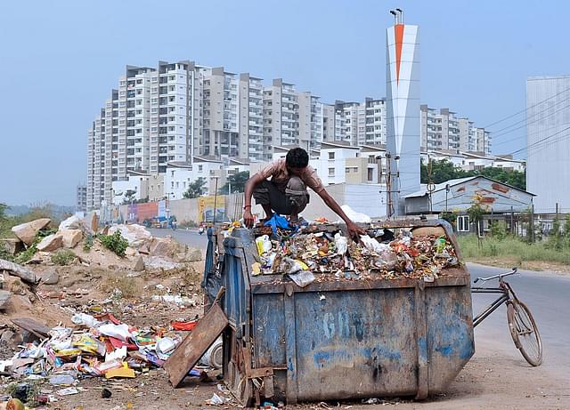 Urban waste collection (NOAH SEELAM/AFP/Getty Images)