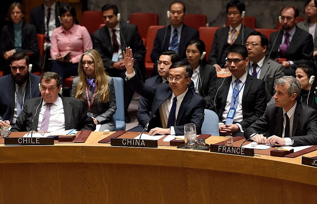 The Chinese representative during a UNSC vote (DON EMMERT/AFP/Getty Images)