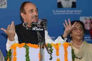 Union Minister of Health and Family Welfare Ghulam Nabi Azad delivers his address while Union Minister of State for Health Santosh Chaudhary looks on at the Government Medical College in Amritsar on August 28, 2013. Azad visited the city to attend the launch of the National Health Mission - Free Drug Initiative and National Iron Plus Initiative scheme at Government Medical College. AFP PHOTO/NARINDER NANU (Photo credit: NARINDER NANU/AFP/Getty Images)