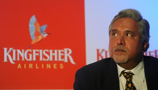 

Chairman and CEO of India’s Kingfisher Airlines Vijay Mallya looks during a press conference in Mumbai on November 15, 2011. Kingfisher Airlines said it had doubled its losses in the July-September quarter, as its billionaire chief Vijay Mallya was set to announce plans to keep the Indian company afloat. AFP PHOTO/ Punit PARANJPE (Photo credit should read PUNIT PARANJPE/AFP/Getty Images)