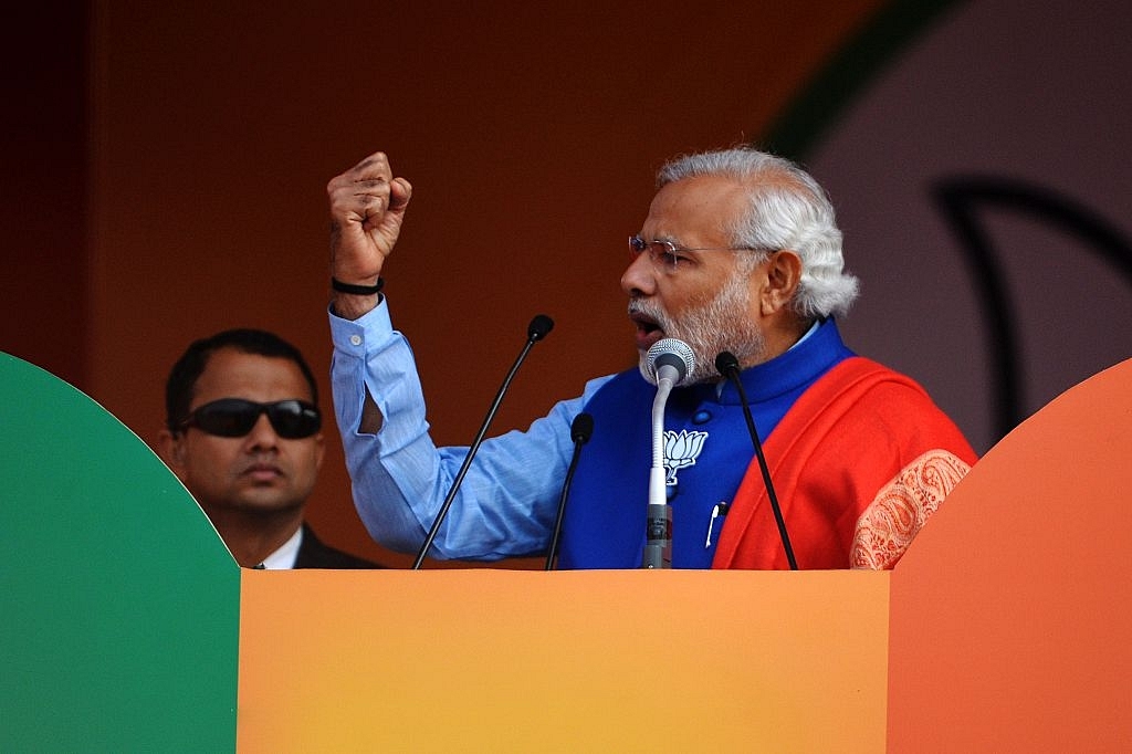 Narendra Modi addresses a rally. Photo credit: Chandan Khanna/AFP/GettyImages