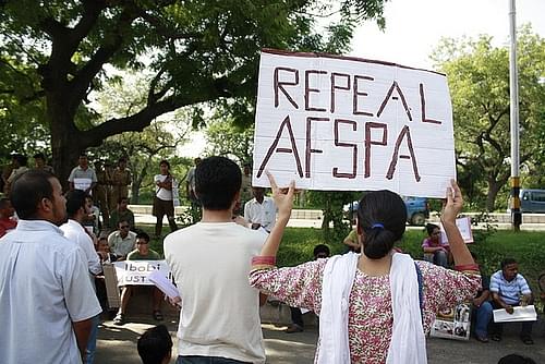 An activist protests against AFSPA.&nbsp;