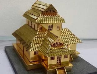 A gold-plated replica of Kerala’s Cheraman Juma Masjid