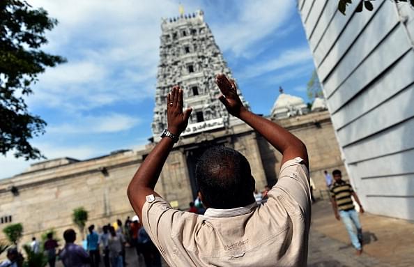 Devotees at a temple/Getty Images
