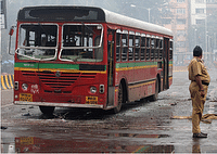 One of the buses damaged by rioters