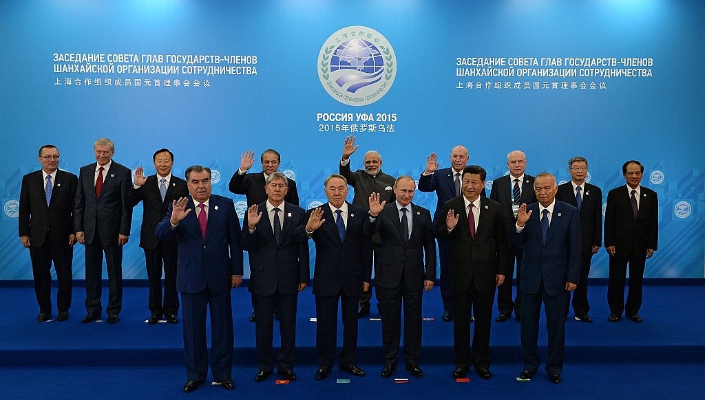 

A group photograph of the SCO heads of state, the heads of observer states and governments, and international organisation delegation heads. First row, from left:President of the Republic of Tajikistan Emomali Rakhmon, President of the Kyrgyz Republic Almazbek Atambaev, President of the Republic of Kazakhstan Nursultan Nazarbayev, President of the Russian Federation Vladimir Putin, President of the People’s Republic of China Xi Jinping, President of the Republic of Uzbekistan Islam Karimov. Second row, from left: UN Under-Secretary-General for Political Affairs Jeffrey Feltman, Secretary-General of the Collective Security Treaty Organisation (CSTO) Nikolai Bordyuzha, Director of the Executive Committee of the SCO Regional Anti-Terrorist Structure Zhang Xinfeng, Prime Minister of the Islamic Republic of Pakistan Nawaz Sharif, Prime Minister of the Republic of India Narendra Modi,SCO Secretary-General Dmitry Mezentsev, Executive Secretary â Chairman of the Executive Committee of the Commonwealth of Independent States (CIS) Sergei Lebedev, Executive Director of the Conference on Interaction and Confidence Building Measures in Asia (CICA) Gong Jianwei, Secretary-General of the Association of Southeast Asian Nations (ASEAN) Le Luong Minh. during the BRICS/SCO Summits - Russia 2015 on July 10, 2015 in Ufa, Russia. (Photo by Host Photo Agency/Ria Novosti via Getty Images)