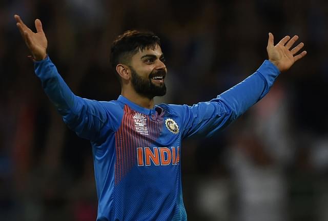 

India’s Virat Kohli celebrates after taking the wicket of West Indies’s Johnson Charles during the World T20 men’s semi-final match between India and West Indies at The Wankhede Cricket Stadium in Mumbai on March 31, 2016. / AFP / INDRANIL MUKHERJEE (Photo credit: INDRANIL MUKHERJEE/AFP/Getty Images)