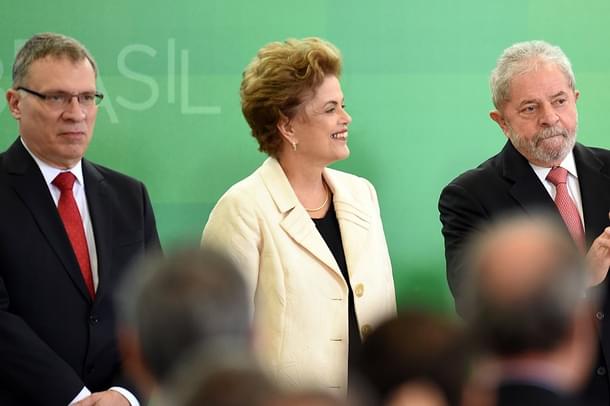 Brazilian President 
Dilma Rousseff (C) and former president Luiz Inacio Lula da Silva (Photo credits - AFP/Getty Images)