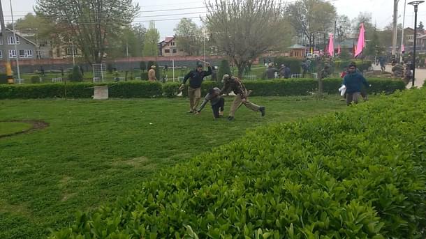 Two policemen beating one student in NIT Srinagar