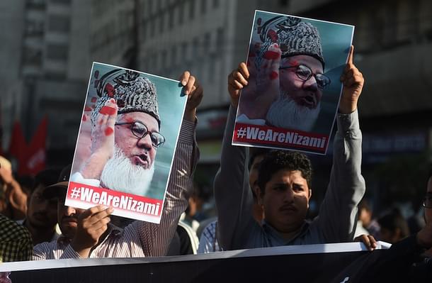 Pakistani students shout slogans during a protest against the execution of the leader of Bangladesh’s top Islamist party Jamaat-e-Islami, Motiur Rahman Nizami, in Karachi on May 11, 2016. (Photo: RIZWAN TABASSUM/AFP/Getty Images)