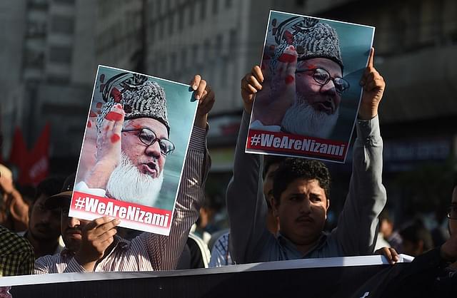 

Pakistani students shout slogans during a protest against the execution of the leader of Bangladesh’s top Islamist party Jamaat-e-Islami, Motiur Rahman Nizami, in Karachi on May 11, 2016. (Photo: RIZWAN TABASSUM/AFP/Getty Images)