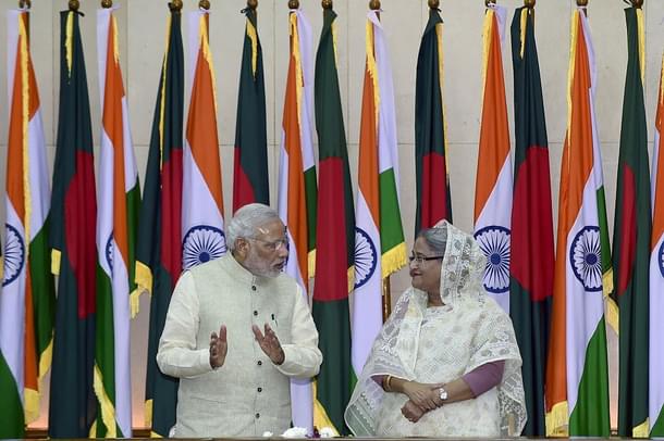 Modi with Bangladeshi Prime Minister Sheikh Hasina during the Land Boundary Agreement signing ceremony (Photo credits: MUNIR UZ ZAMAN/AFP/Getty Images)
