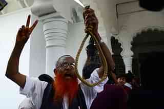 Bangladeshi activists celebrate the hanging of war criminals of the 1971 war. (STR/AFP/Getty Images)