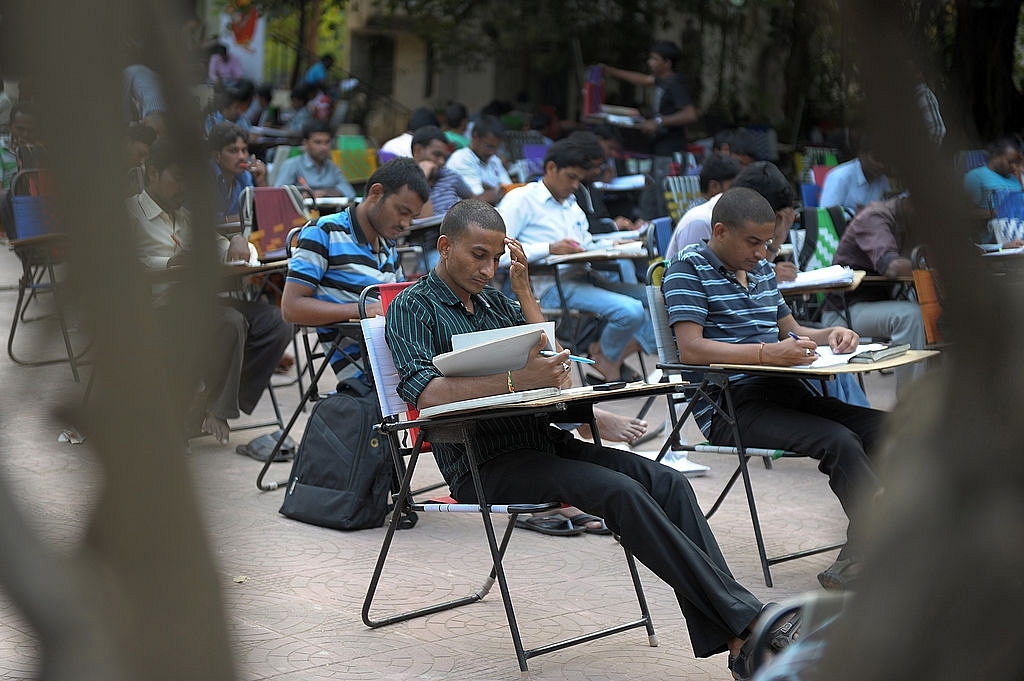 India students examination (NOAH SEELAM/AFP/Getty Images)