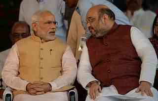 Prime Minister Narendra Modi and BJP president Amit Shah. (PUNIT PARANJPE/AFP/Getty Images)