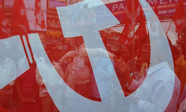 Communist flag (NOAH SEELAM/AFP/Getty Images)