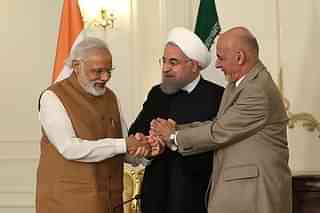 Modi with Iran’s Rouhani and Afghanistan’s Ashraf Ghani, signing the Chabahar Treaty (Pool / Iran Presidency/Anadolu Agency/Getty Images)