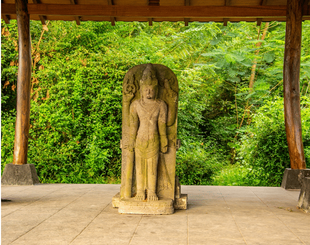 <b><i>Vishnu on the top of a small hill.</i></b>