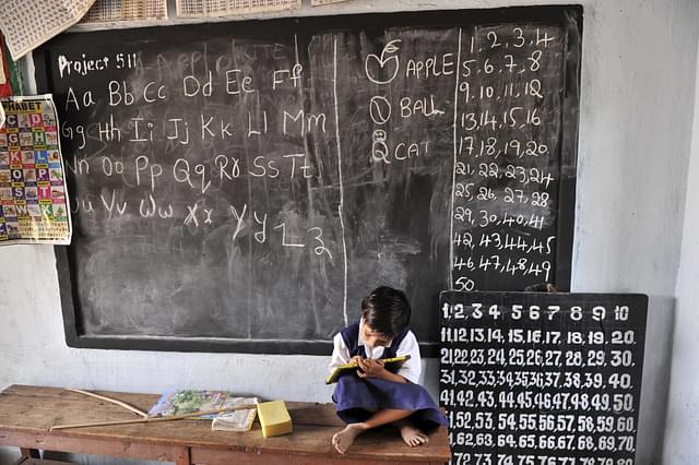A  girl in a government school. (NOAH SEELAM/AFP/Getty Images)