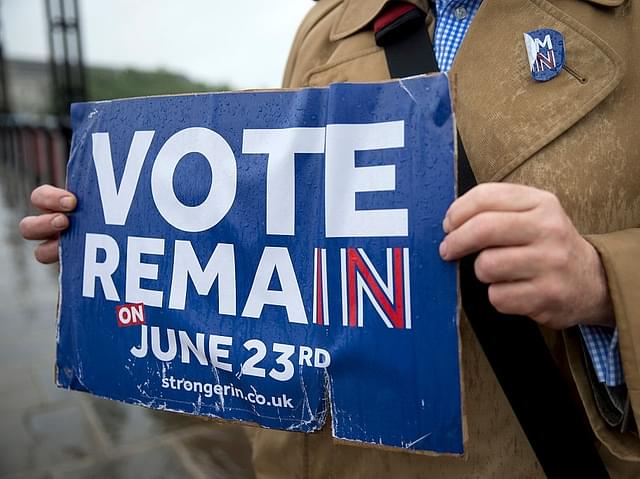
Campaigners hold placards for ‘Britain Stronger in Europe’, the 
official ‘Remain’ campaign group seeking to avoid a Brexit, ahead of the
 forthcoming EU referendum, in London on June 20, 2016.(Photo credits - Getty Images)

