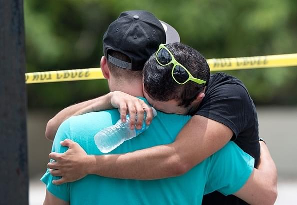 A man weeps for the victims of the Orlando massacre (GREGG NEWTON/AFP/Getty Images)&nbsp;