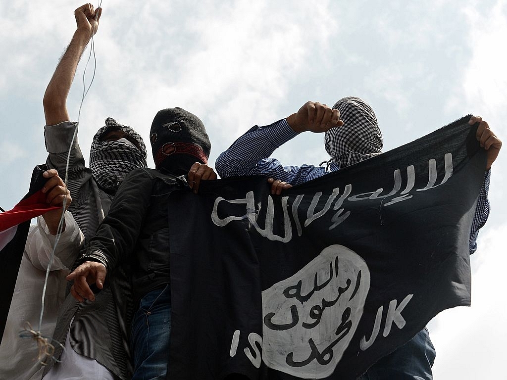 ISIS flags being waved in Kashmir in 2014 (TAUSEEF MUSTAFA/AFP/Getty Images)&nbsp;