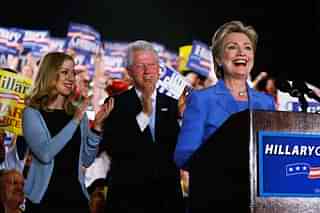 Democratic presidential hopeful U.S. Senator Hillary Clinton (D-NY) speaks as her husband President Bill Clinton and daughter Chelsea Clinton stand behind her at her primary night event in the Egyptian Room of the Murat Centre May 6, 2008, in Indianapolis, Indiana. Sen. Barack Obama, (D-IL) and Senator Hillary Clinton (D-NY) continue the Democrats battle for their parties presidential nomination. (Photo by Joe Raedle/Getty Images)