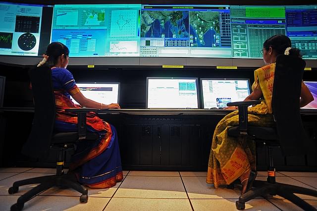 

Scientists from the Indian Space Research Organisation (ISRO) work in the Indian Regional Navigational Satellite System (IRNSS) control room at the Indian Deep Space Network (IDSN), a network of large antennas and communication facilities that support India’s interplanetary spacecraft missions, located at Byalalu village about 50 kms from Bangalore city on May 28, 2013. The ISRO inaugurated the Satellite Navigation Centre for Indian Regional Navigational Satellite System at the IDSN facility today. AFP PHOTO/ Manjunath KIRAN (Photo credit: Manjunath Kiran/AFP/Getty Images)