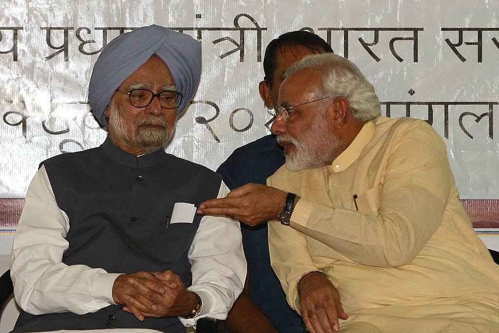 Manmohan Singh and Narendra Modi (SAM PANTHAKY/AFP/Getty Images)&nbsp;