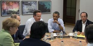 G8 leaders (clockwise from front C) Japan’s Prime Minister Shinzo Abe, German Chancellor Angela Merkel, Russian President Vladimir Putin, Britain’s Prime Minister David Cameron, US President Barack Obama and French President Francois Hollande take part in the second Plenary Session of the G8 summit at the Lough Erne resort near Enniskillen in Northern Ireland on June 18, 2013. Russia and the US agreed at the G8 summit to push for Syria peace talks, but Presidents Vladimir Putin and Barack Obama made clear their deep differences over the conflict. AFP PHOTO / POOL / IAN LANGSDON (Photo credit: IAN LANGSDON/AFP/Getty Images)