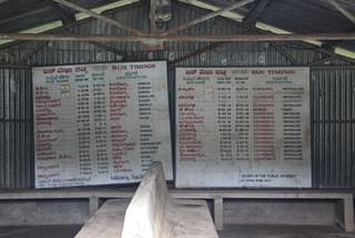 A board in the abandoned bus stand with bus timings