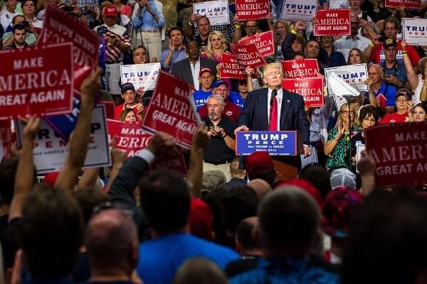 Republican Presidential candidate Donald Trump addresses supporters at the James A. Rhodes Arena on 22 August 2016 in Akron, Ohio. (Angelo Merendino/Getty Images)