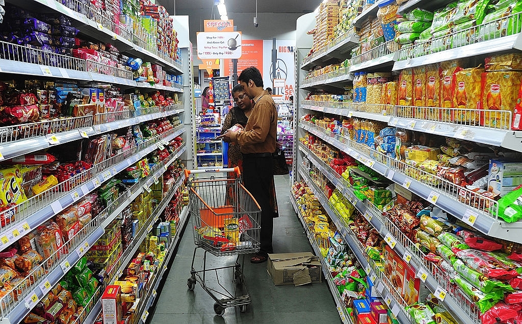 An Indian
family shops at a supermarket in. Photo credit: INDRANIL MUKHERJEE/AFP/Getty
Images