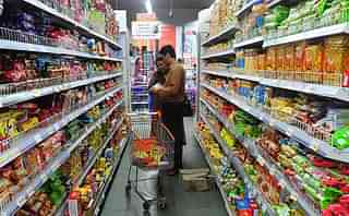 An Indian
family shops at a supermarket in. Photo credit: INDRANIL MUKHERJEE/AFP/Getty
Images