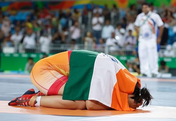 India’s Sakshi Malik celebrates after winning against Kirghyzstan’s Aisuluu Tynybekova in their women’s 58 kg freestyle bronze medal match on August 17, 2016, during the wrestling event of the Rio 2016 Olympic Games at the Carioca Arena 2 in Rio de Janeiro. / AFP / Jack GUEZ (Photo credit should read JACK GUEZ/AFP/Getty Images) 