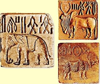 Three different seals from early river valley civilisation. Photo credit: WikiMedia Commons.